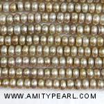 3187 center drilled pearl 6-6.5mm champagne color.jpg